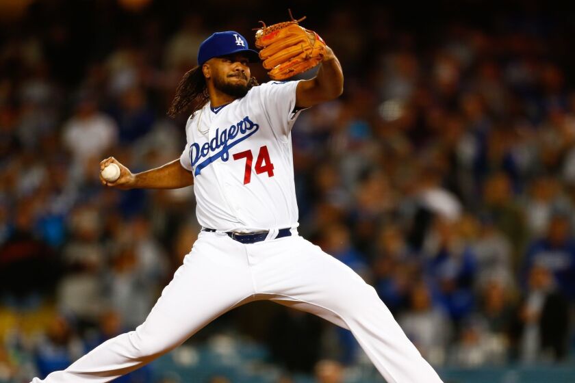LOS ANGELES, CALIF. - APRIL 03: Los Angeles Dodgers relief pitcher Kenley Jansen (74) pitches against the San Francisco Giants during a game at Dodger Stadium on Wednesday, April 3, 2019 in Los Angeles, Calif. (Kent Nishimura / Los Angeles Times)