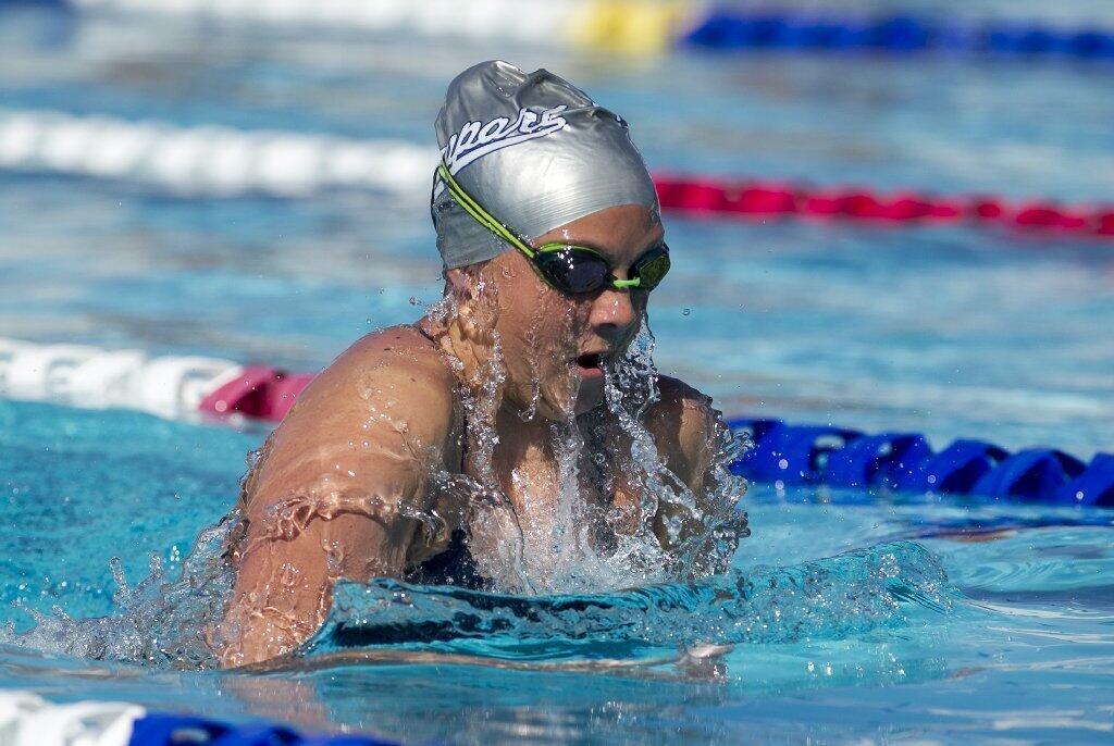 Newport Harbor High's Kili Skibby competes in the 200-yard individual medley against Los Alamitos.