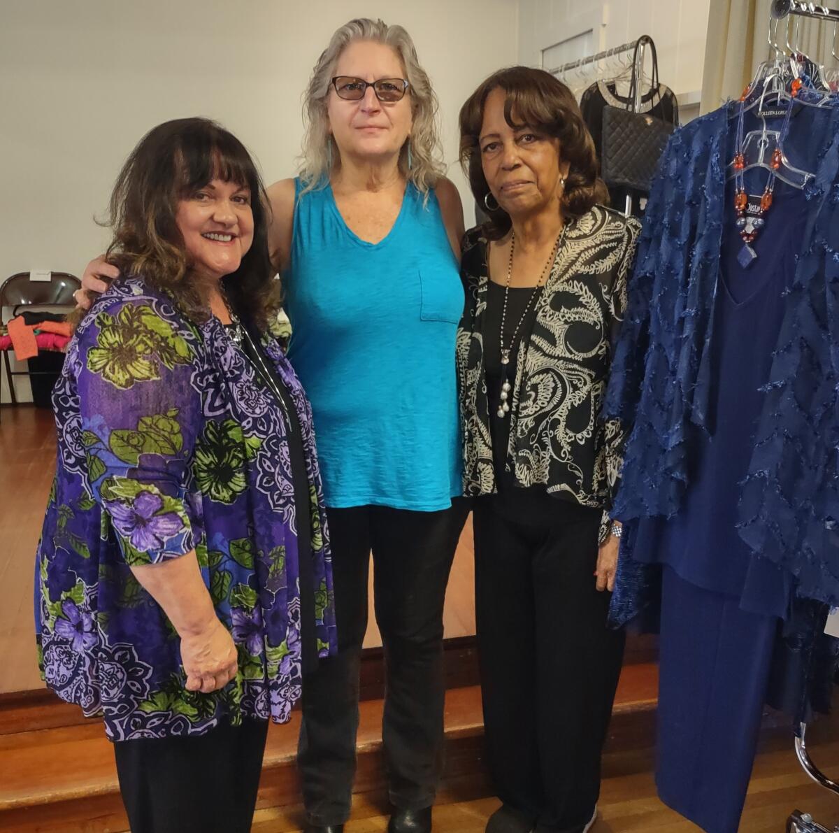 Sales associates at Glamor Girlz Boutique are, from left, Monica Zech, Denise Rich and boutique owner Peggy Harris.