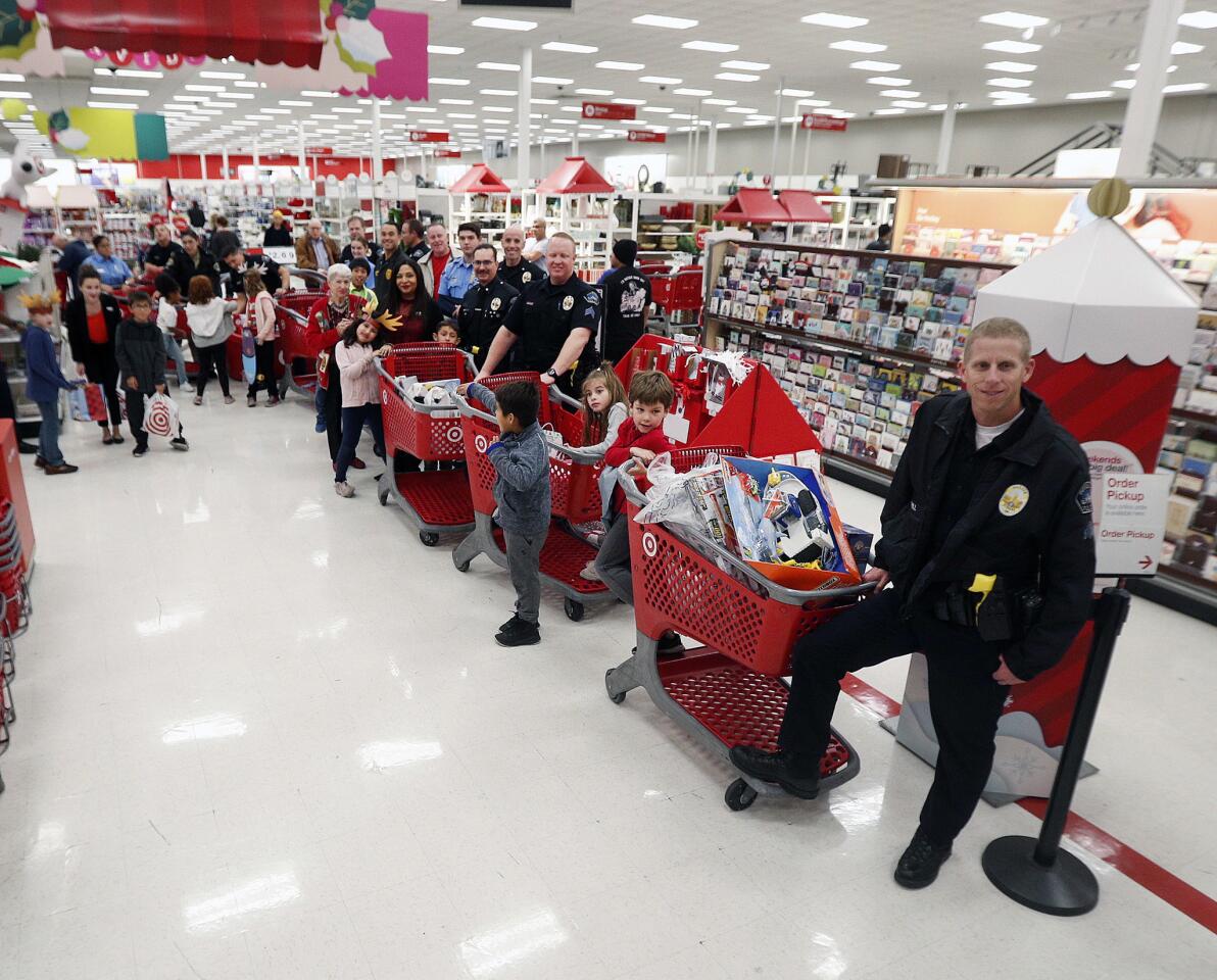 Photo Gallery: Burbank Boys and Girls Club children match up with Burbank Police Department for annual Heroes and Helpers event