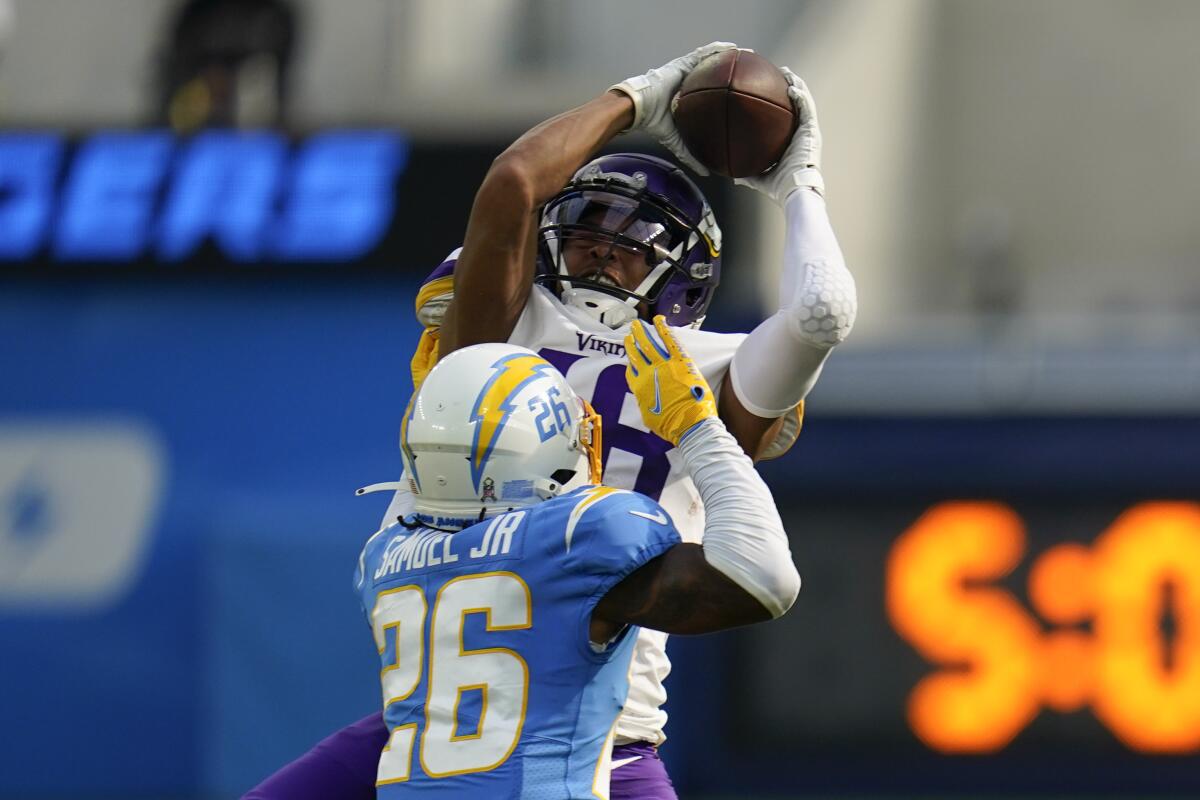 Chargers cornerback Asante Samuel Jr. is charged with holding.