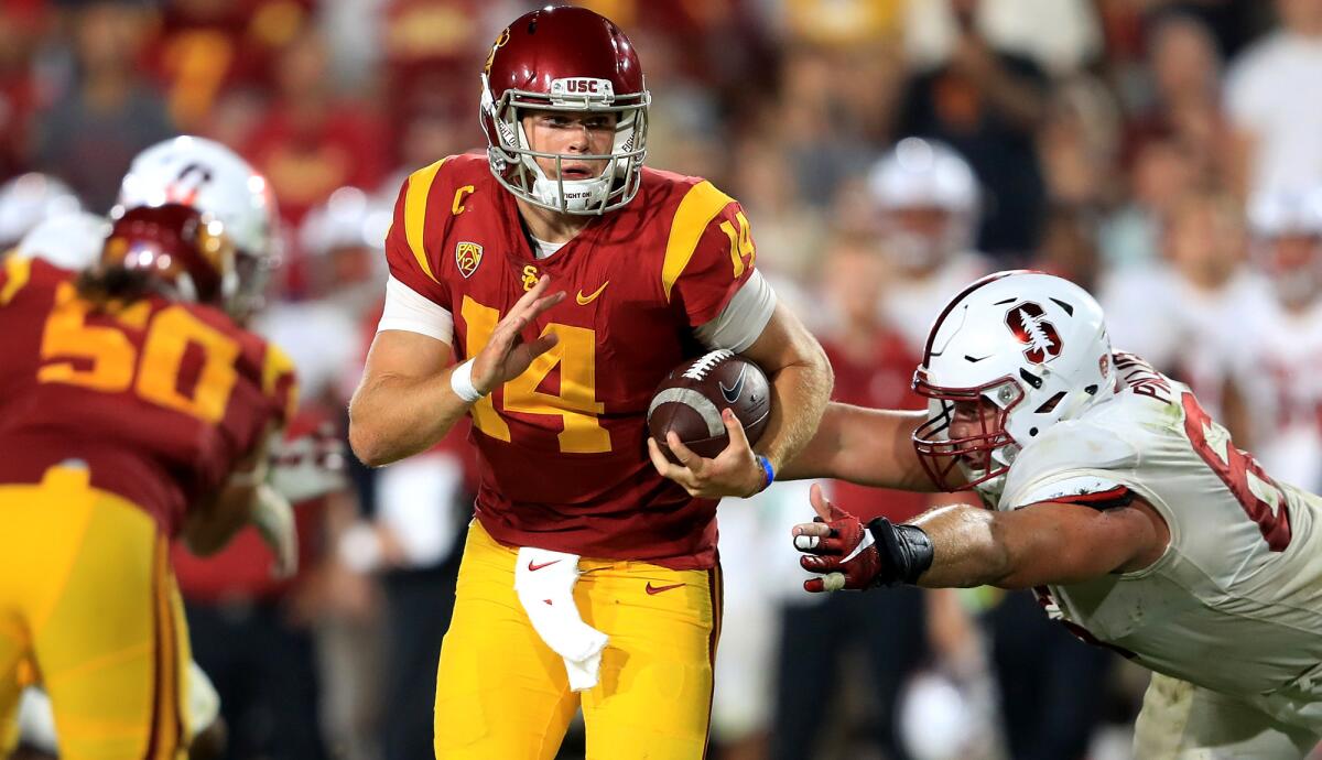 USC quarterback Sam Darnold scrambles against Stanford.
