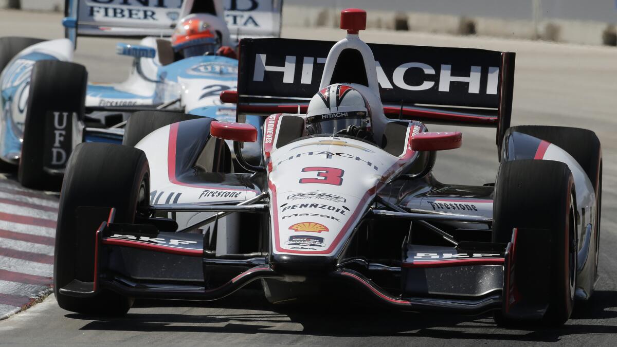 Helio Castroneves competes in the second race of the IndyCar Series Grand Prix of Detroit on Sunday.