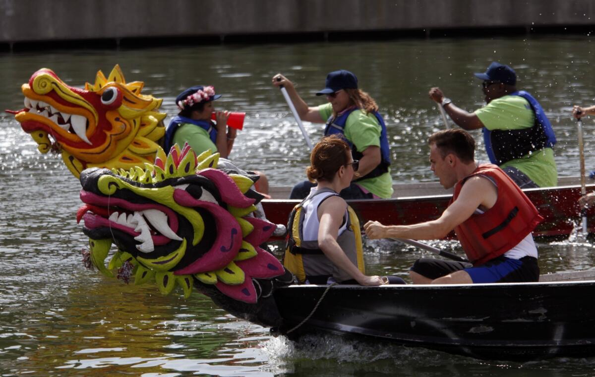 People on colorful dragon boats