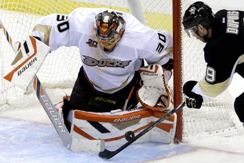 Ducks goaltender Viktor Fasth stops a shot by Penguins left wing Pascal Dupuis during a game last week.
