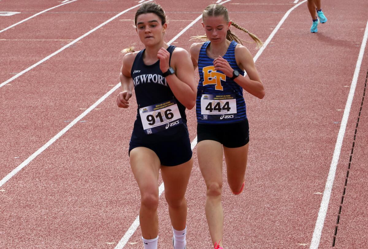 Newport Harbor's Marley McCullough (916) competes in the Division 2 girls' race in the CIF finals at Mt. SAC on Saturday.