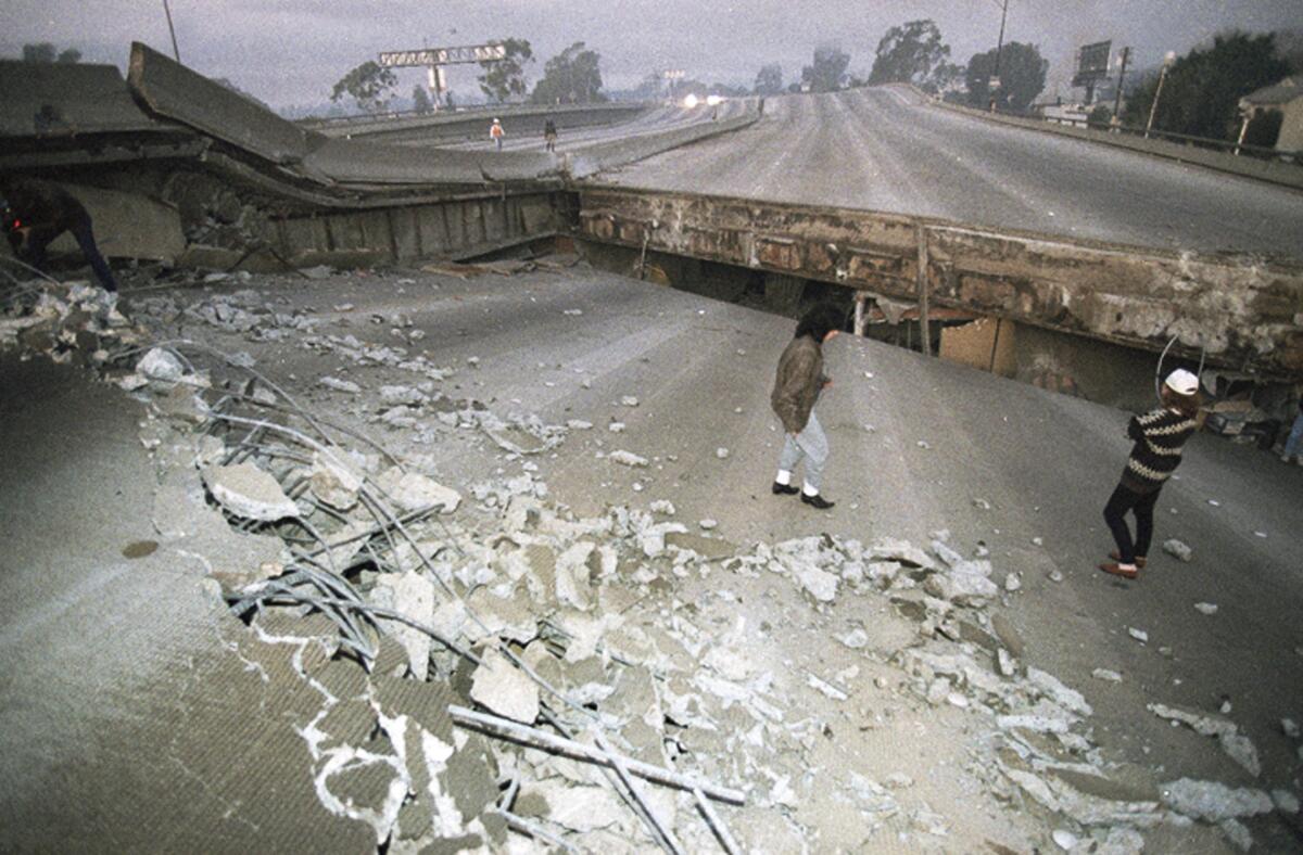The Santa Monica Freeway collapsed over La Cienega Boulevard following the Northridge quake on Jan. 17, 1994.