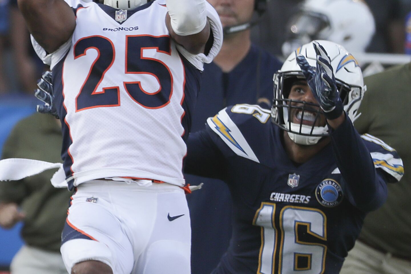 Denver Broncos cornerback Chris Harris Jr. intercepts a pass intended for Chargers receiver Tyrell Williams during second half action at Stubhub Center on Sunday.