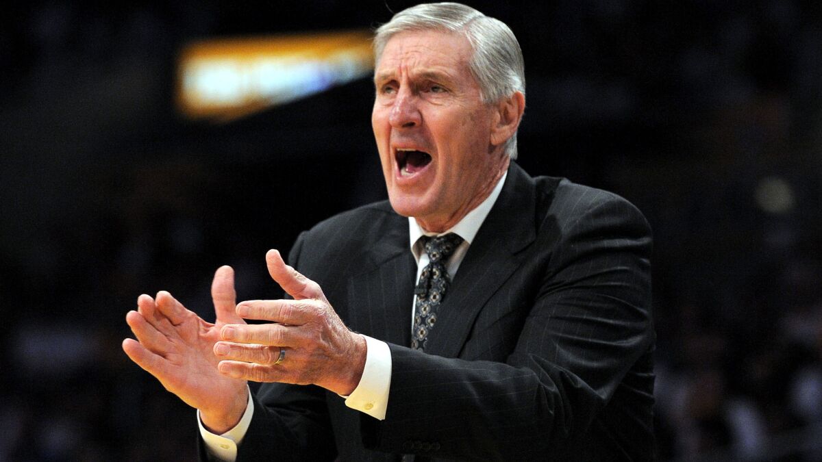 Jerry Sloan yells instructions to the Utah Jazz during a playoff game against the Lakers.