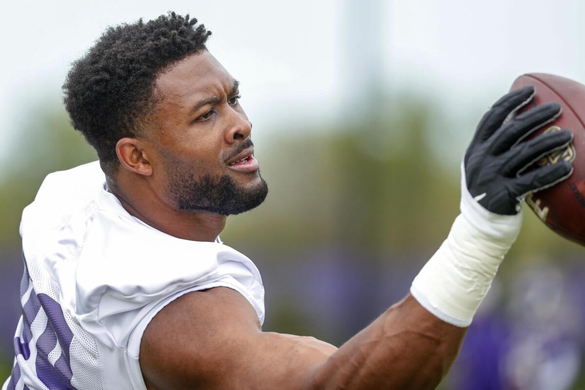 Minnesota Vikings defensive end Danielle Hunter takes part in drills at the NFL football team's practice facility in Eagan, Minn., Tuesday, May 17, 2022. (AP Photo/Bruce Kluckhohn)