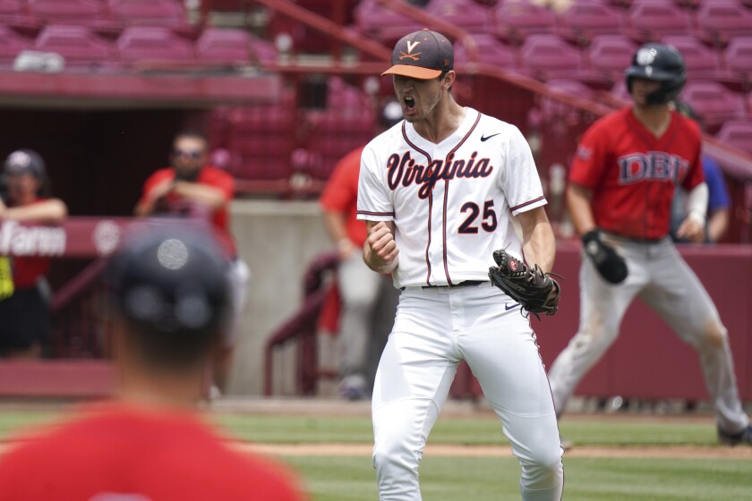 Virginia pitcher Griff McGarry reacts after an inning-ending strikeout during an NCAA college baseball tournament super regional game against Dallas Baptist, Sunday, June 13, 2021, in Columbia, S.C. (AP Photo/Sean Rayford)