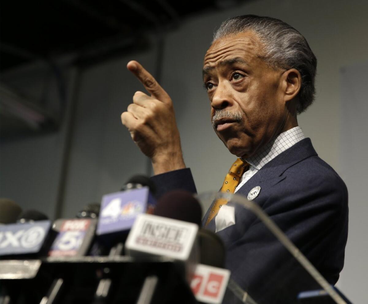 The Rev. Al Sharpton at a news conference at which he admitted working with the FBI to help catch mob figures in the 1980s. Sharpton said he was not a "rat" but rather a "cat" chasing bad guys.