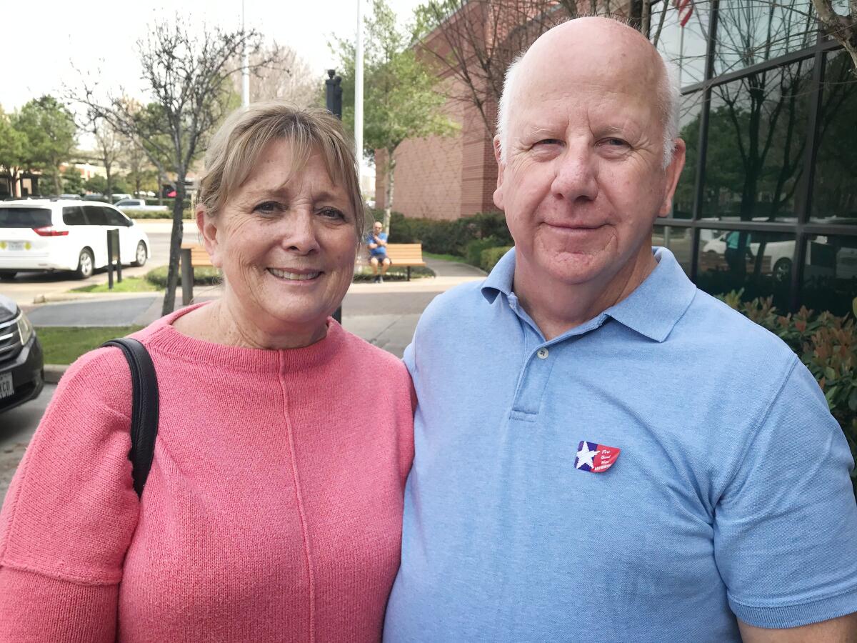 Terri and Gary Priddy voted at a library in their Houston suburb.