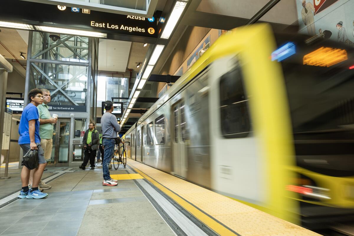 Passengers wait at the Little Tokyo / Arts District Metro Station.