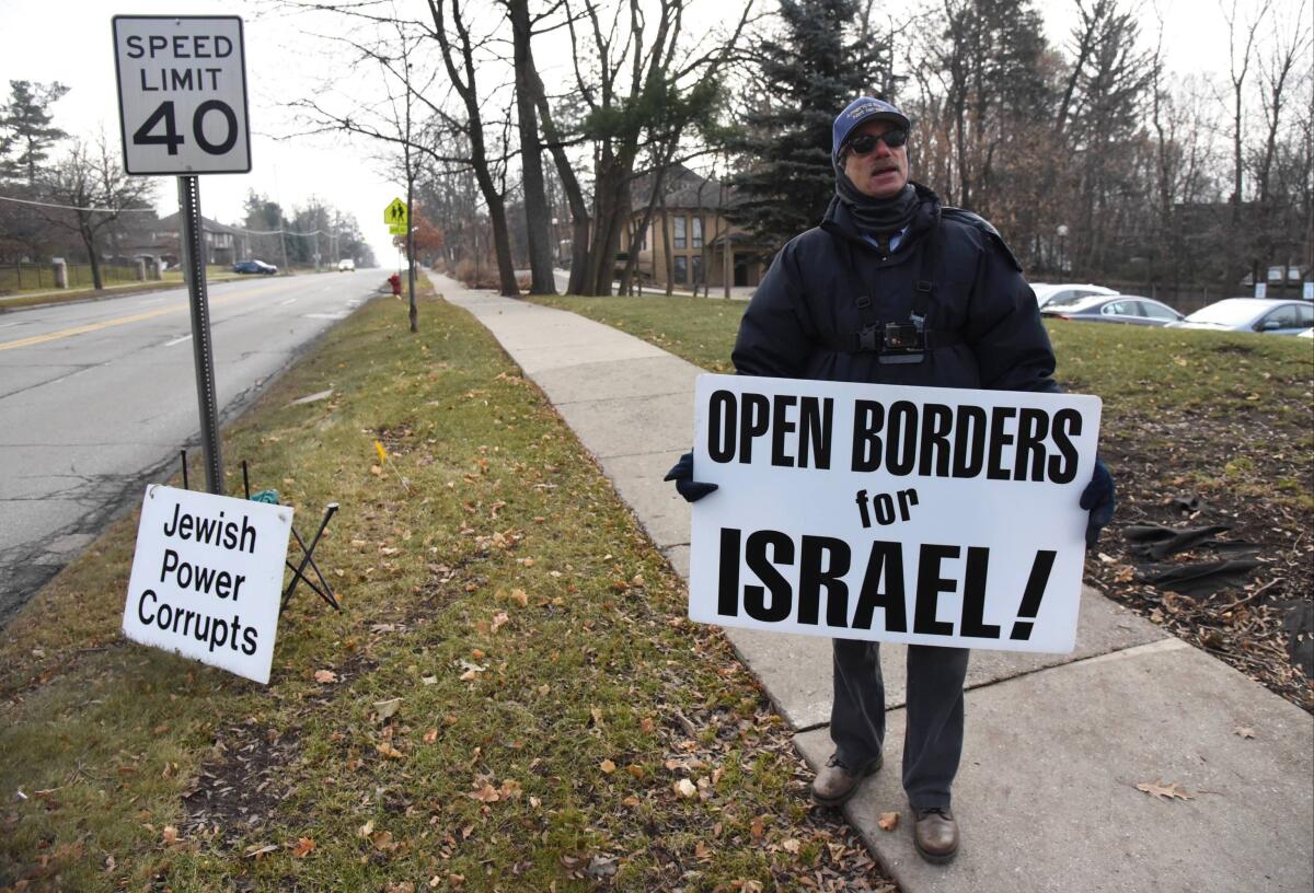 Henry Herskovitz leads a protest with anti-Israel and anti-Jewish messages outside the Beth Israel Congregation in Ann Arbor, Mich., on Dec. 28, 2019. A federal appeals court said Wednesday, Sept. 15, 2021, that protests at the site were protected by the First Amendment. (Ryan Stanton/Ann Arbor News via AP)