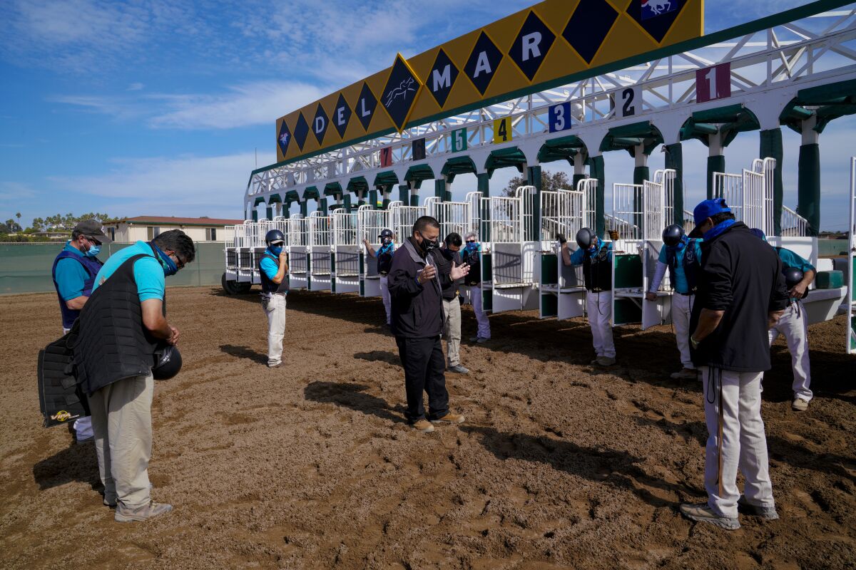 At Del Mar, chaplain Eli Hernandez helps backstretch workers with everything from clothing and food to immigration paperwork.