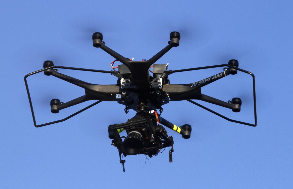 A drone with a camera is used to shoot scenes for a television show in Santa Clarita in September. The L.A. City Council approved an ordinance Wednesday that criminalizes violating FAA drone regulations.