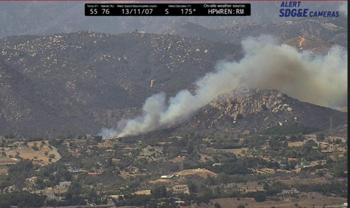 Firefighters attacked a brush fire north of Fallbrook Sunday afternoon.