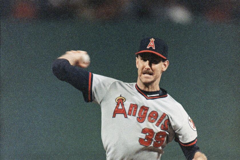 Angels' Mike Witt pitches against the Boston Red Sox in Game 1 of the 1986 ALCS.