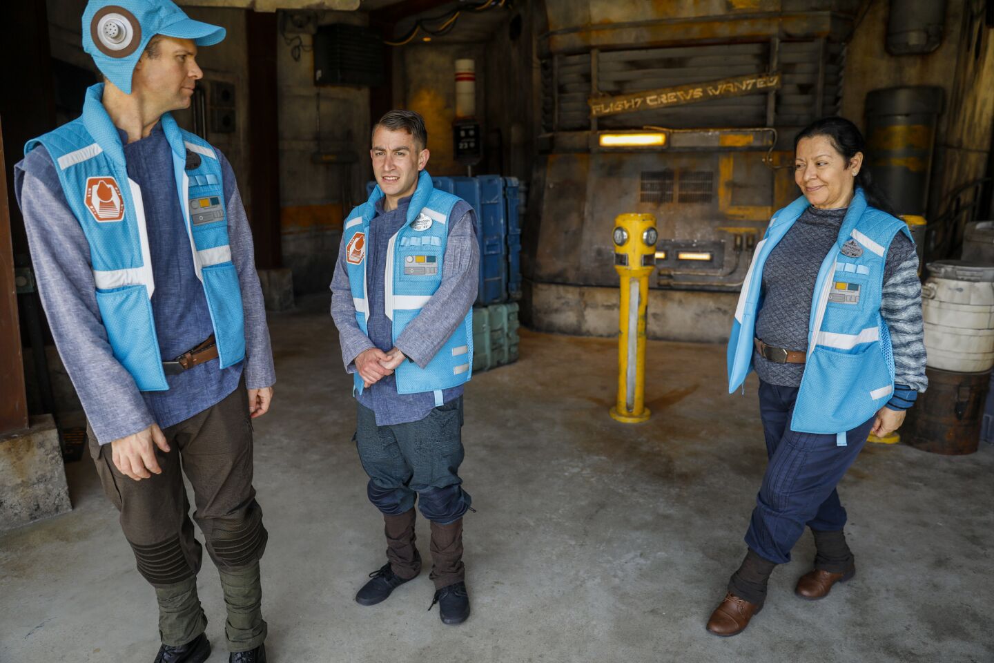 Cast members greet people at the start of The Millennium Falcon: Smugglers Run ride, inside Star Wars: Galaxy's Edge.