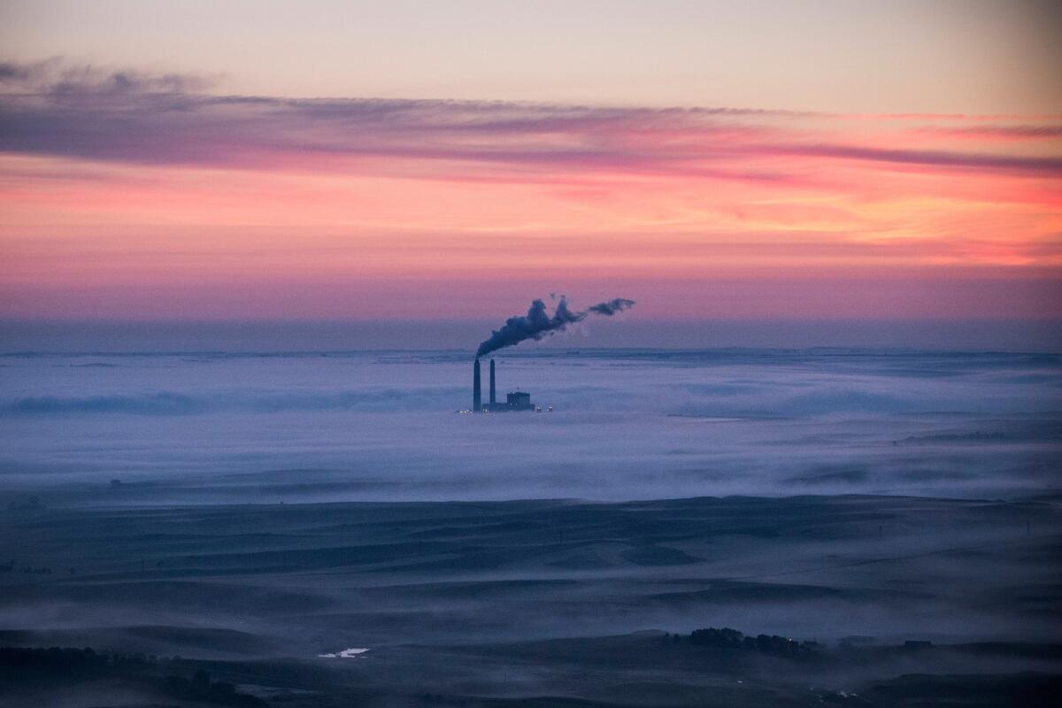 A coal-burning energy plant is seen in an aerial view early one morning near Bismarck, N.D.