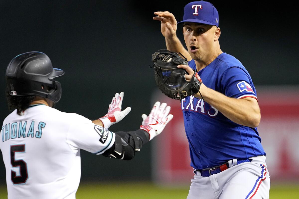 Rangers' Smith goes to hospital after hit in face with pitch