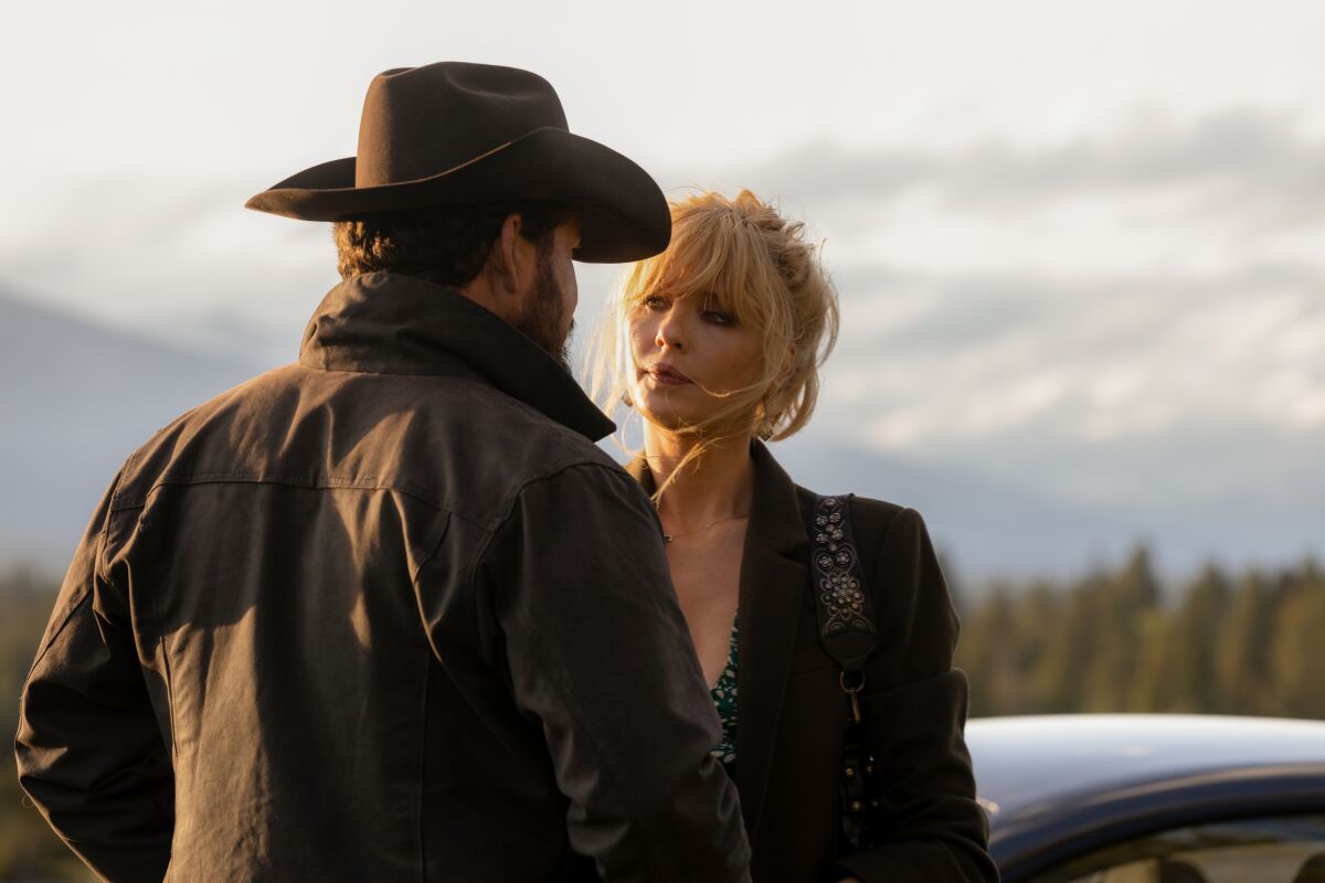 Cole Hauser, left, and Kelly Reilly in "Yellowstone."