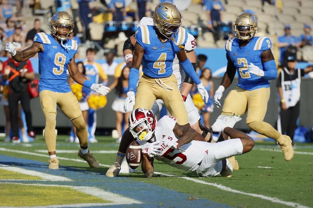 Indiana wide receiver Ke'Shawn Williams dives into the end zone to score a first-half touchdown at the Rose Bowl.