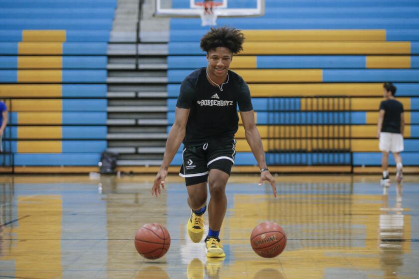 SAN DIEGO, August 8th, 2019 | San Ysidro High School basketball player Mikey Williams practices with his team on Thursday, August 8th, 2019. San Ysidro's Mikey Williams dribbles during a two ball drill at practice on Thursday. Photo by Chadd Cady