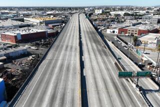 Los Angeles, CA, Sunday, November 12, 2023 - Aerial views of the 10 Freeway a day after a large pallet fire burned below, shutting the freeway to traffic. (Robert Gauthier/Los Angeles Times)