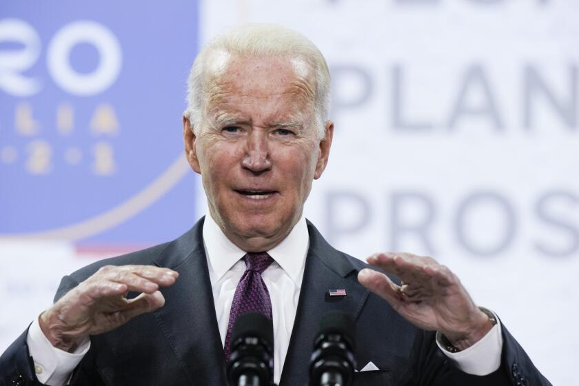 U.S. President Joe Biden speaks during a press conference at the La Nuvola conference center for the G20 summit in Rome, Sunday, Oct. 31, 2021. Leaders of the world's biggest economies made a compromise commitment Sunday to reach carbon neutrality "by or around mid-century" as they wrapped up a two-day summit that was laying the groundwork for the U.N. climate conference in Glasgow, Scotland. (AP Photo/Andrew Medichini)