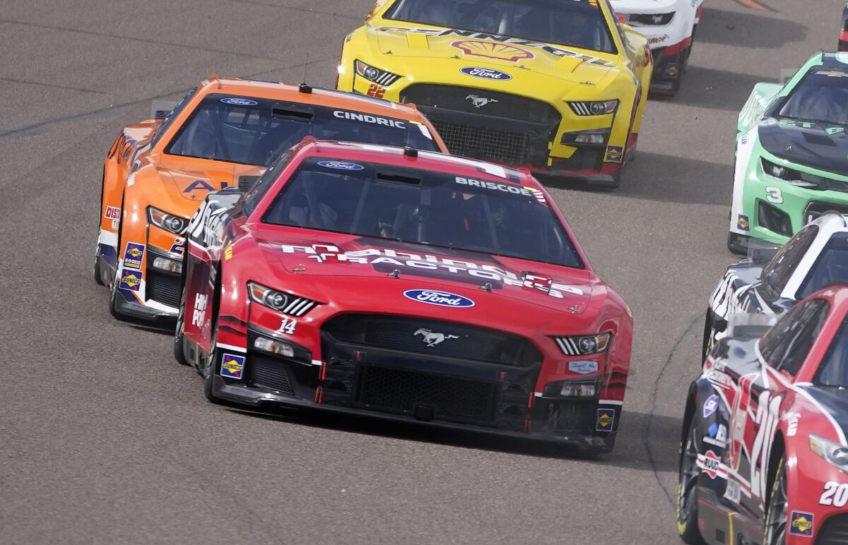 Chase Briscoe guides his No. 14 car through a turn at Phoenix Raceway on Sunday.
