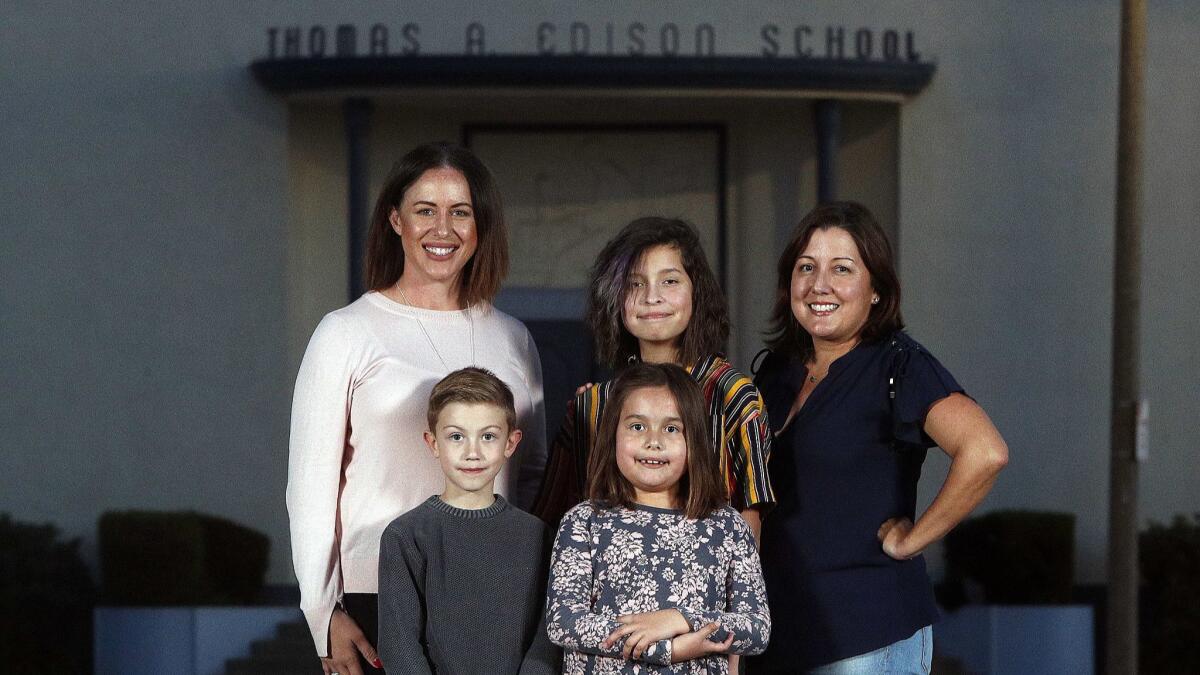 Allison Meadows and her son, Emmett, and Trisha Padilla, with daughters, Grace and Isabella, are two of many Burbank families impacted by the strike by LAUSD teachers and staff. Meadows and Padilla are LAUSD teachers who returned to work this week after a six-day strike.