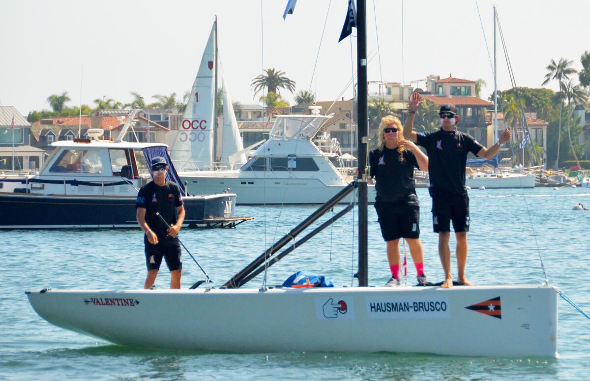 Winners of the 56th Governor's Cup, from left, Enzo Menditto, Max Brennan and skipper Jeffrey Petersen on Saturday.