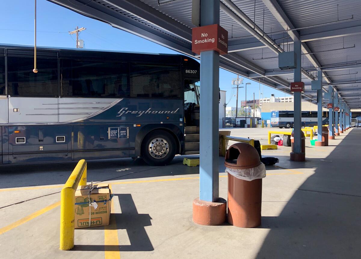 A Greyhound bus parked at a station