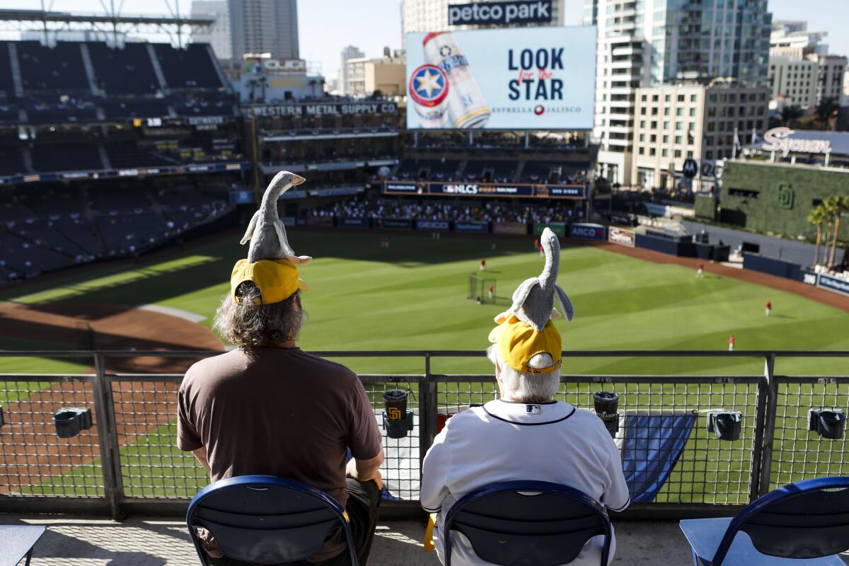 New T-shirts, old superstitions: Padres fans all in for