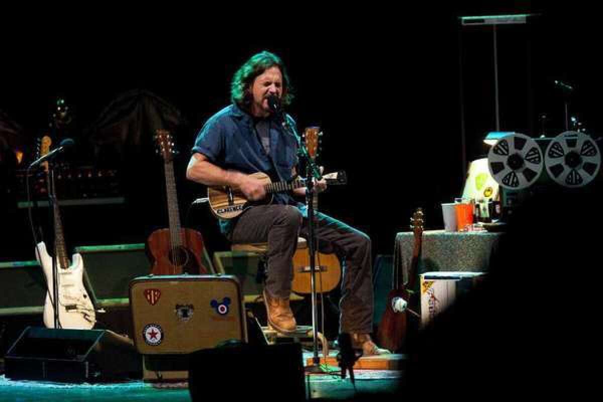 Former Pearl Jam front man Eddie Vedder performs on ukulele at the Wiltern Theater in 2011.