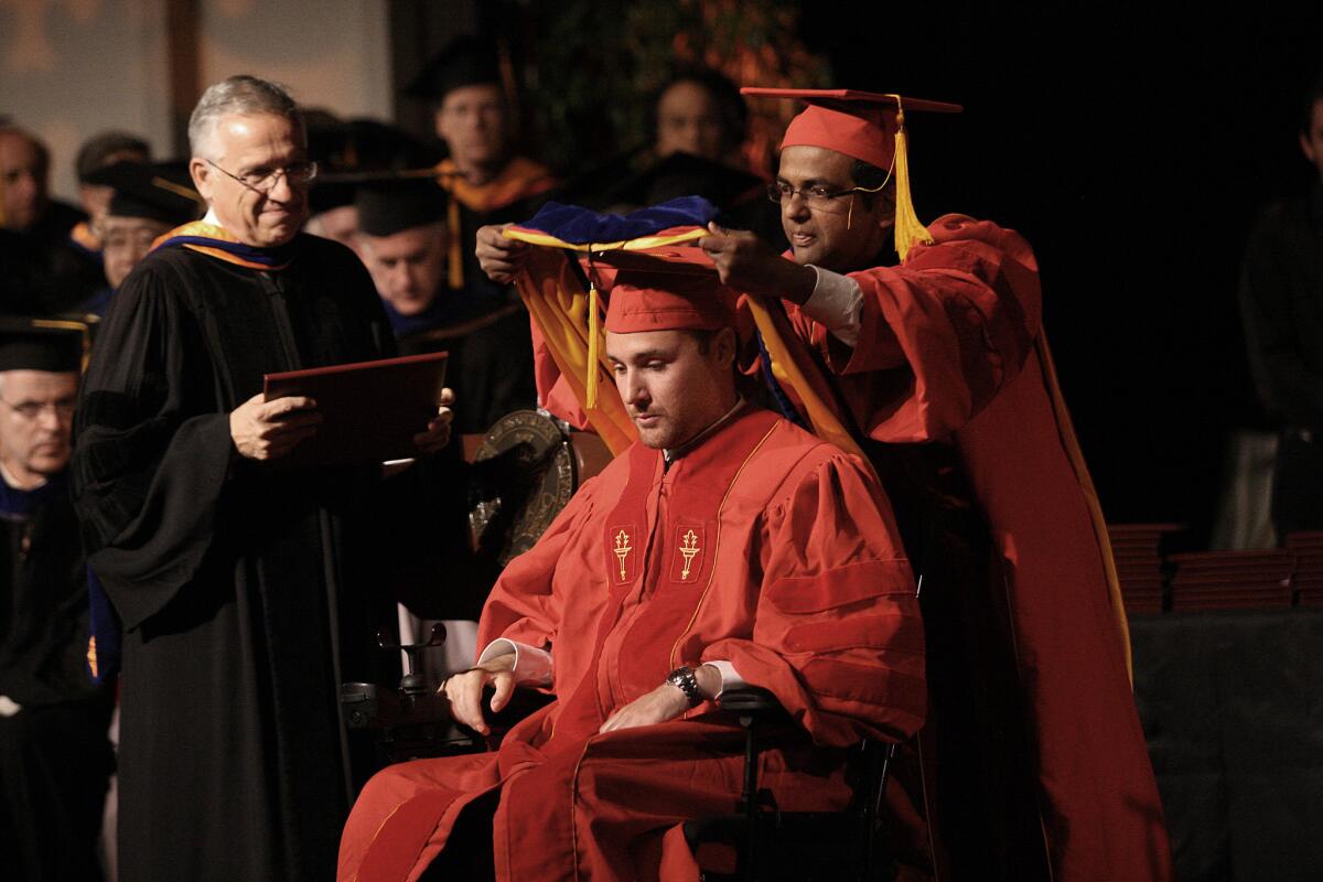 Ryan Williams, who studied underwater robotics, at his PhD hooding ceremony at USC's Viterbi School of Engineering on May 15.