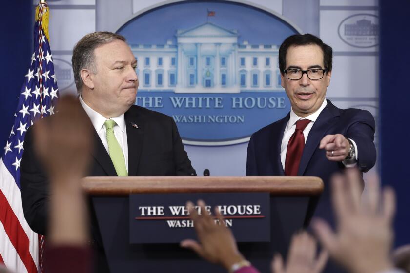 Secretary of State Mike Pompeo and Treasury Secretary Steve Mnuchin brief reporters about additional sanctions placed on Iran, at the White House, Friday, Jan. 10, 2019, in Washington. (AP Photo/ Evan Vucci)
