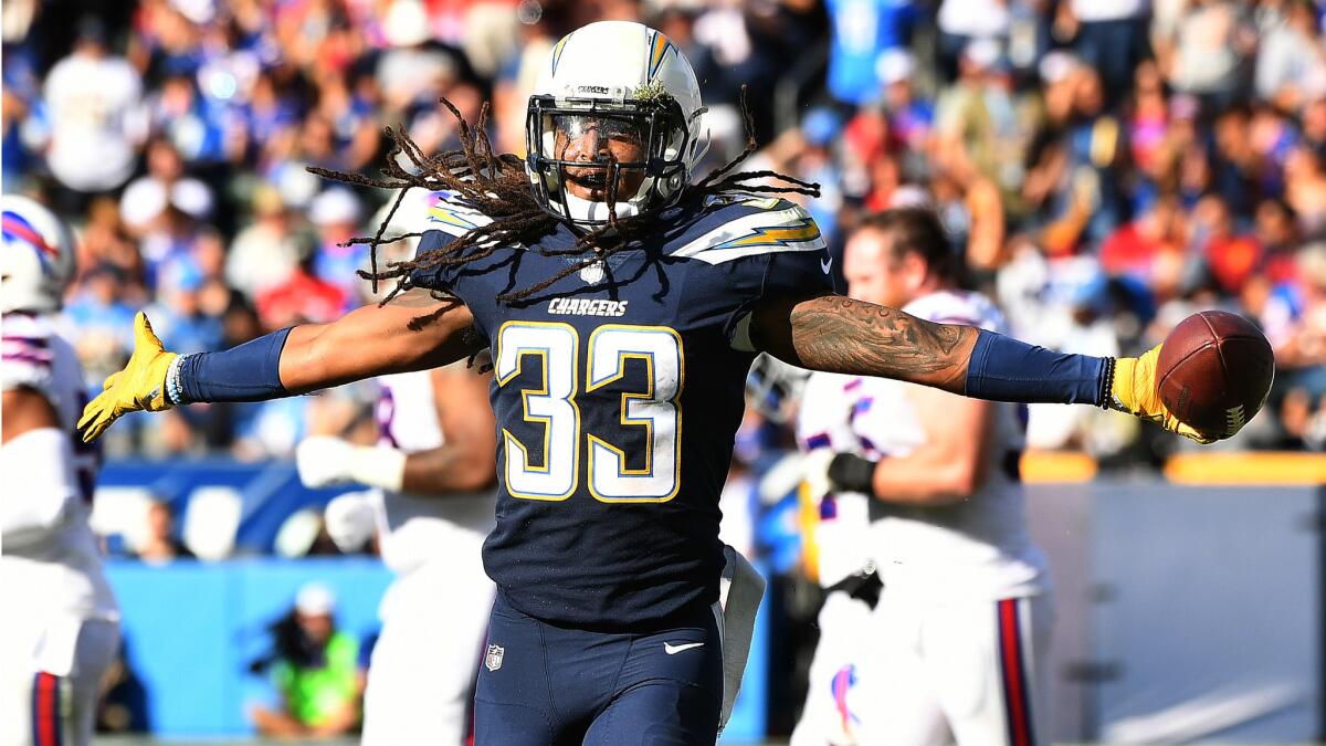 Chargers safety Tre Boston celebrates his interception against the Bills earlier this season.