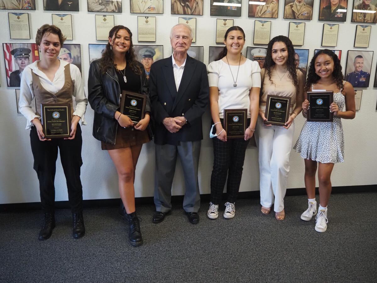 Flying Leatherneck Historical Foundation essay contest winners with Judge Victor Bianchini.