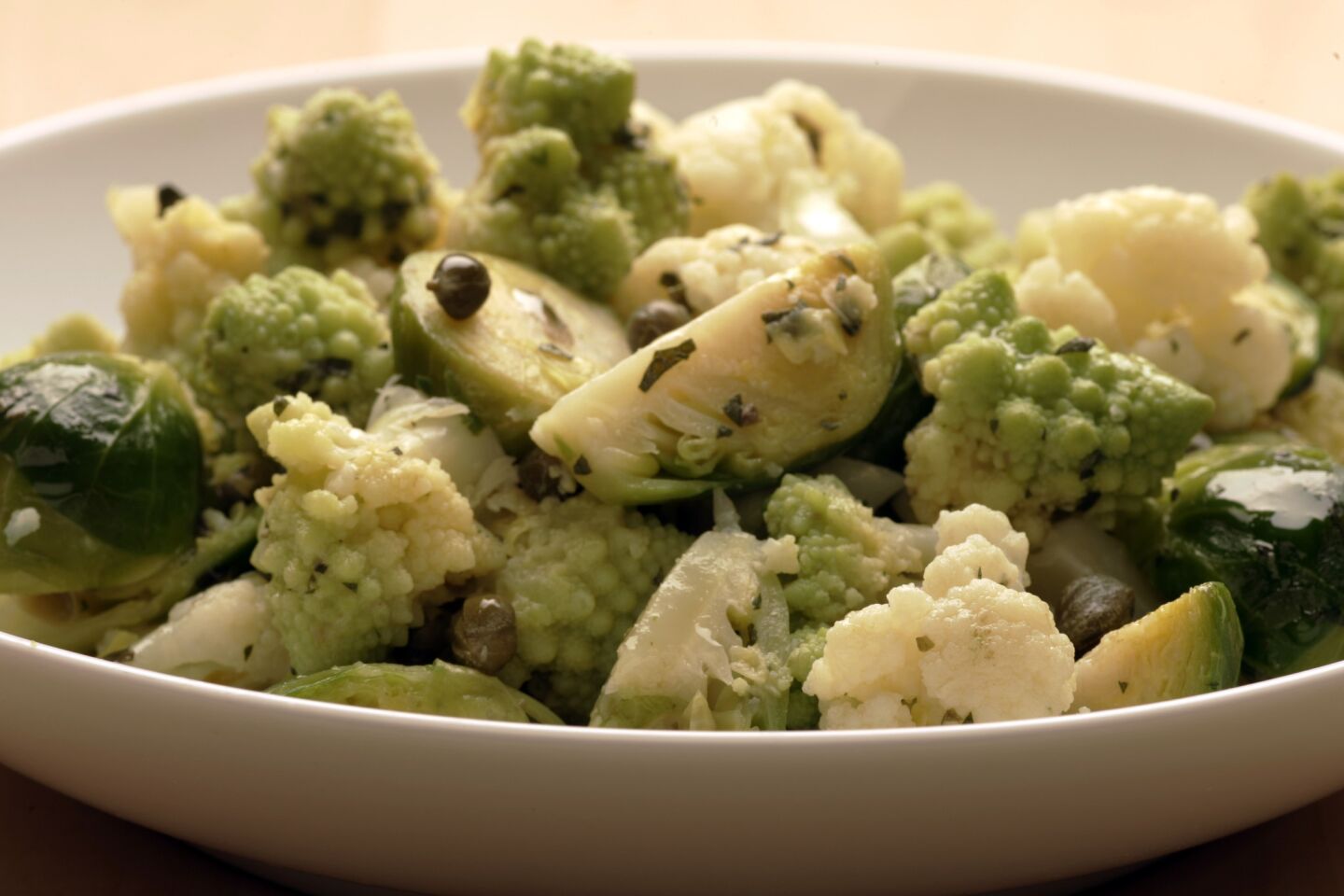 Brussels sprouts can stand up to forceful flavorings. Recipe: Cauliflower and Brussels sprout salad with mustard-caper butter