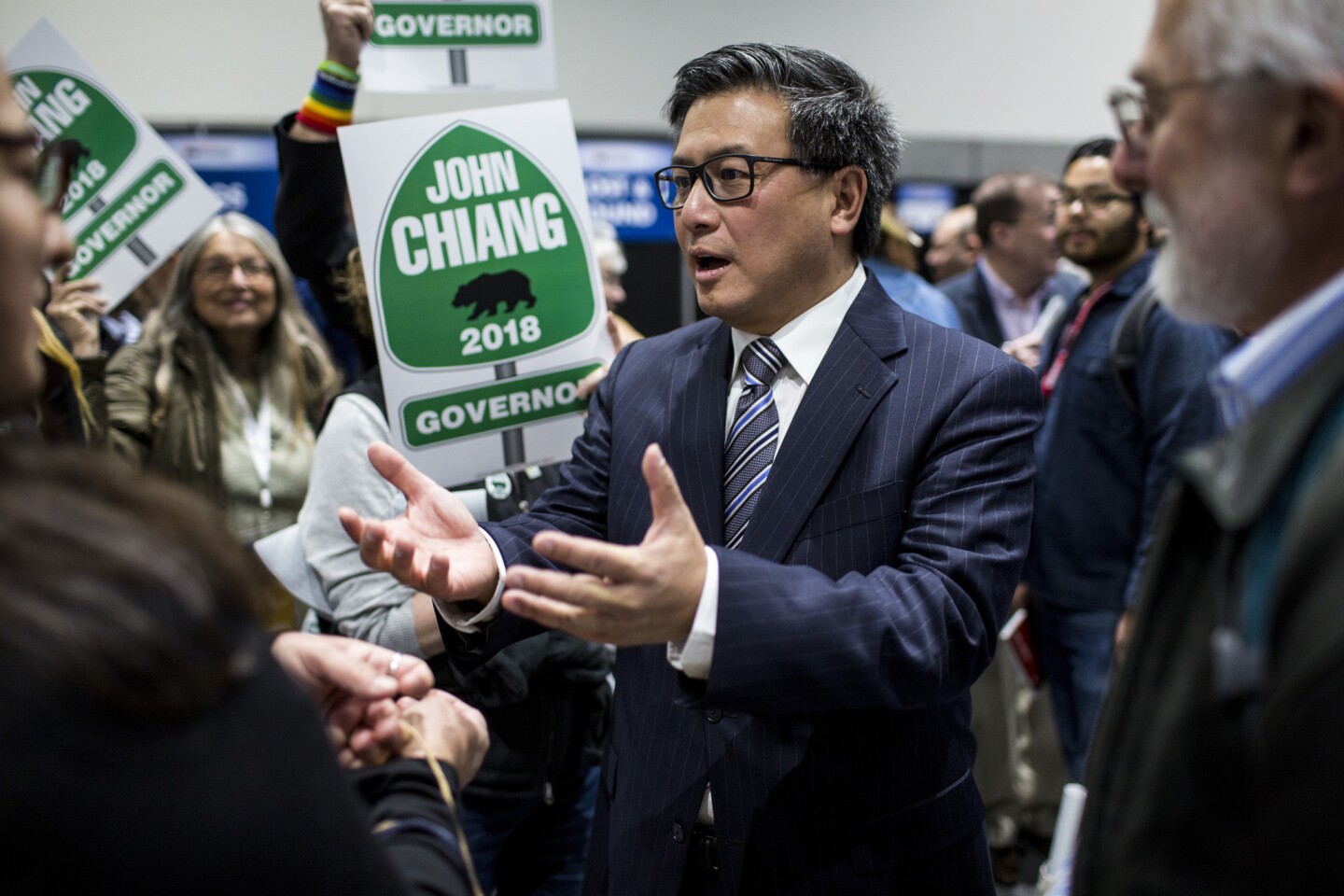 Democratic gubernatorial candidate and current state Treasurer John Chiang greets supporters during the California Democratic Convention.
