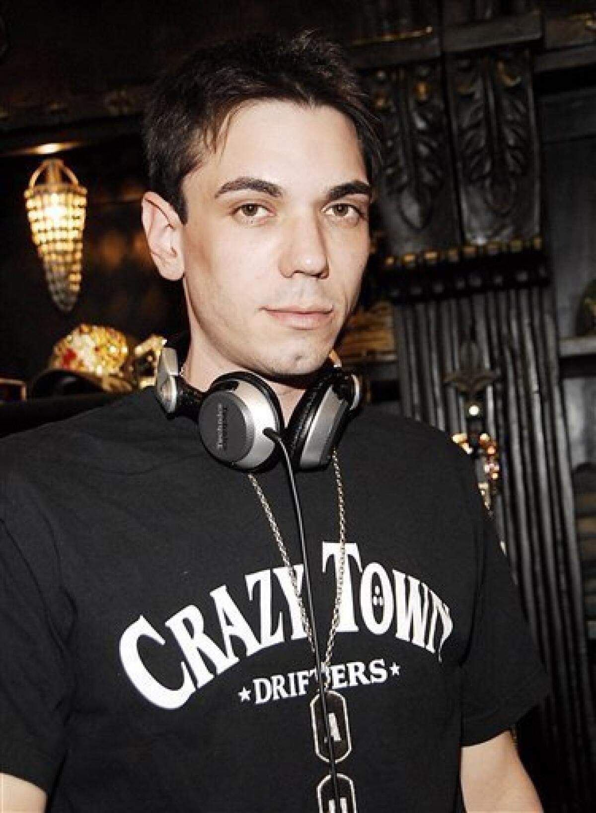 In this March 18, 2006 photo, celebrity disc jockey Adam Goldstein, also known as DJ AM, spins records at the Moody Blues clothing store opening in Scottsdale, Ariz. A law enforcement official says the celebrity disc jockey known as DJ AM has been found dead in a New York City apartment. .(AP Photo/Dan Steinberg)