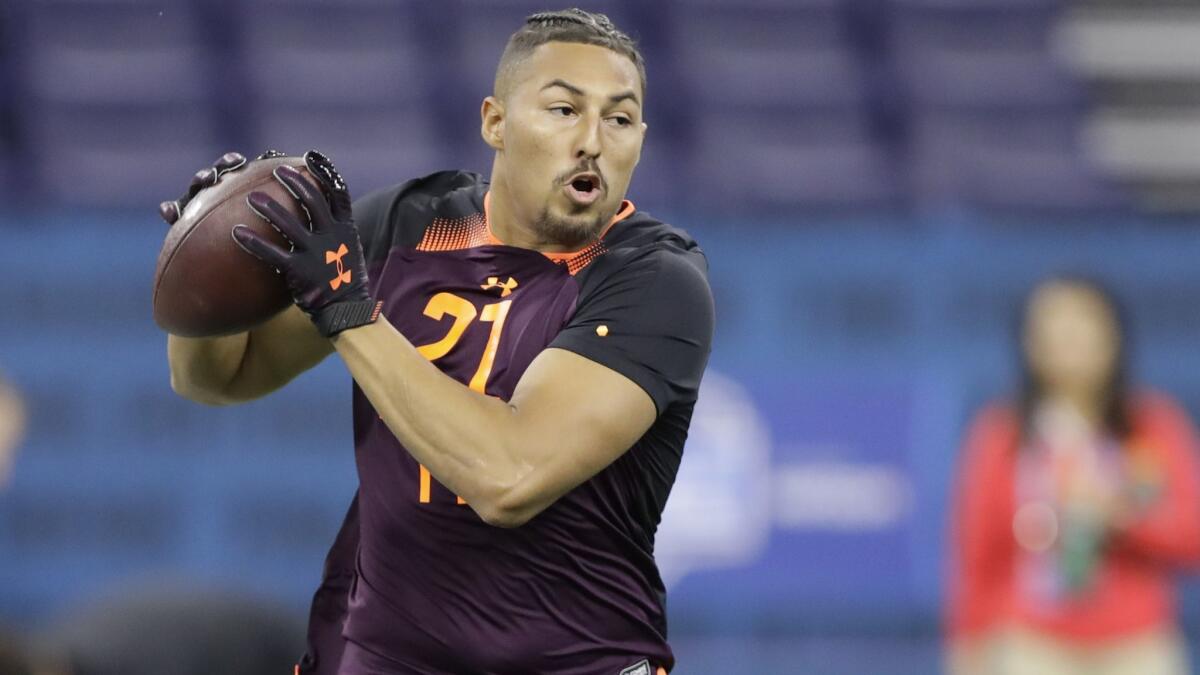 Former UCLA tight end Caleb Wilson runs a drill during the NFL football scouting combine on March 2 in Indianapolis.