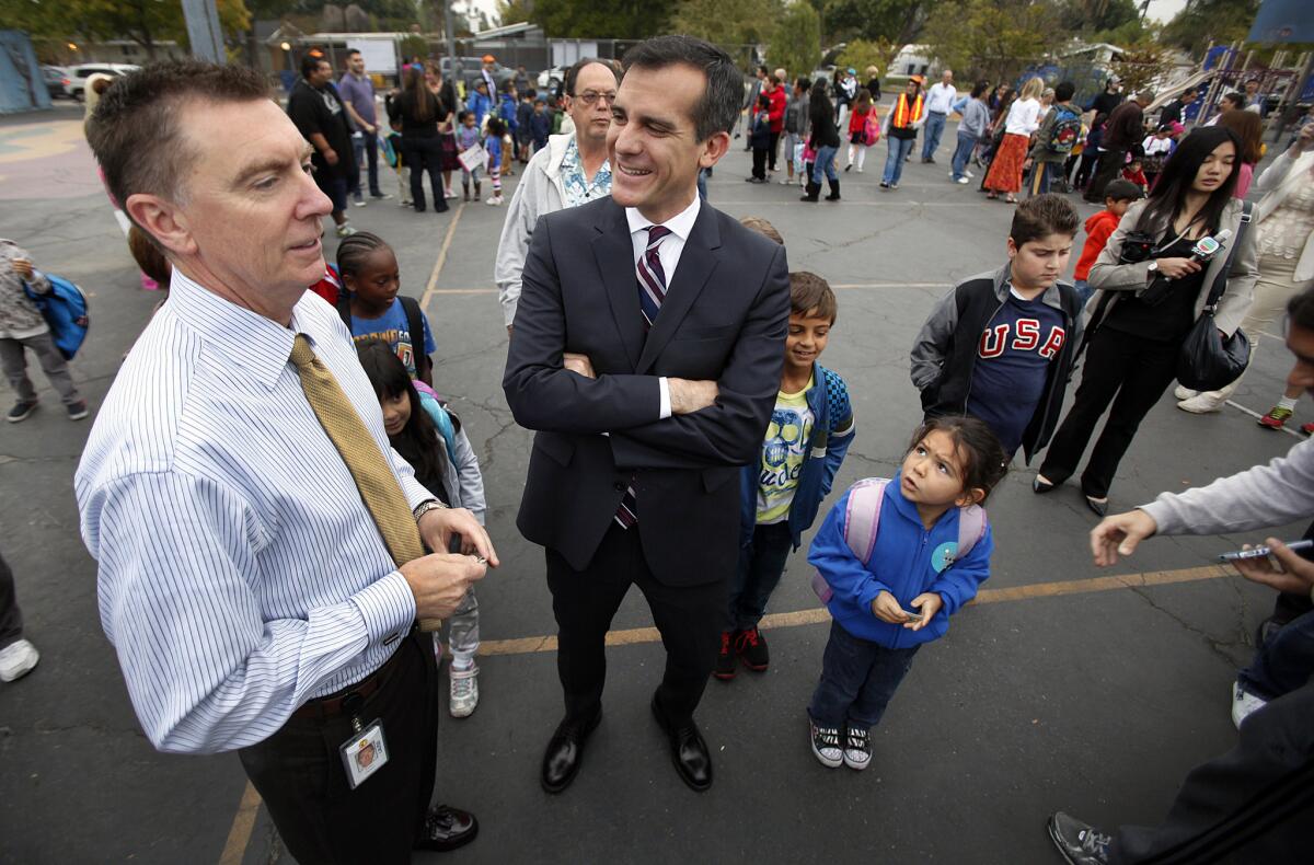 Los Angeles Unified School District Supt. John Deasy, left, and Mayor Eric Garcetti, have announced a summer learning program for the city.