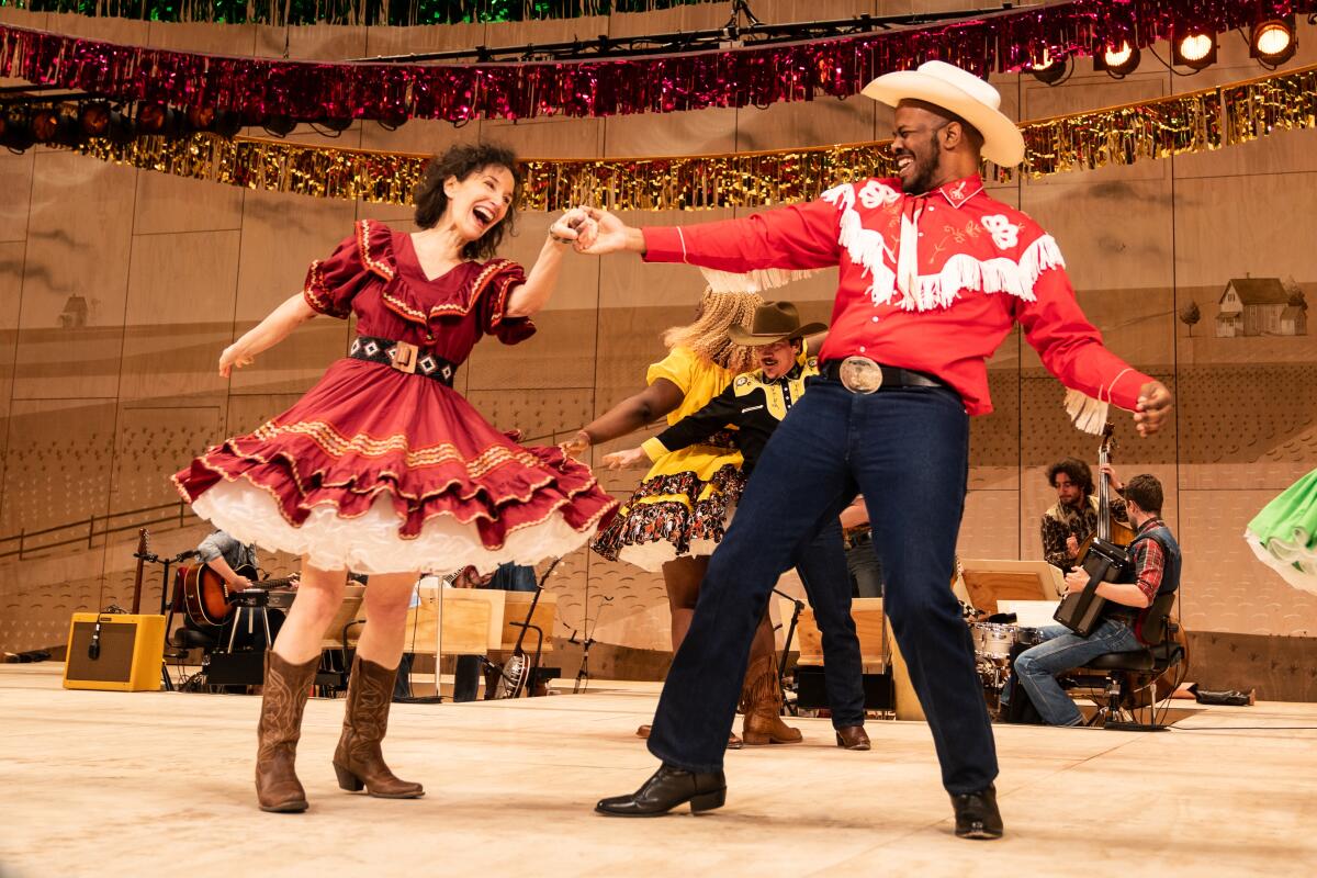 Barbara Walsh and Patrick Clanton dance in a performance of  “Oklahoma!"  