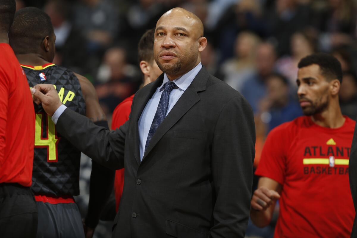 Darvin Ham stands on the sideline during his time as an assistant coach with the Atlanta Hawks in 2016.