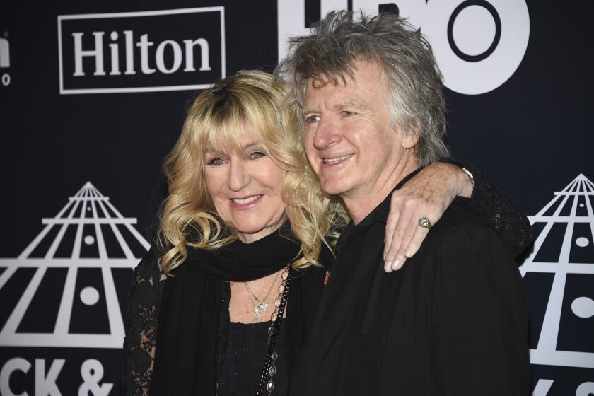 Christine McVie, left, and Neil Finn of Fleetwood Mac attend the 2019 Rock & Roll Hall of Fame induction ceremony at the Barclays Center in New York in 2019.