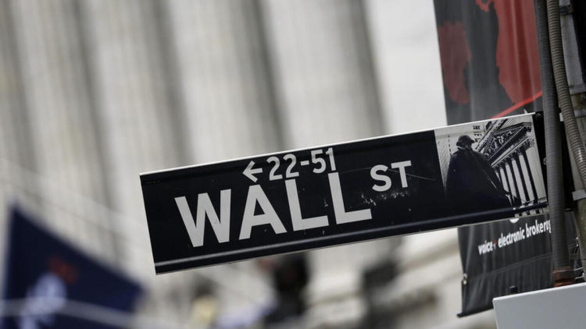 A Wall Street sign outside the New York Stock Exchange.